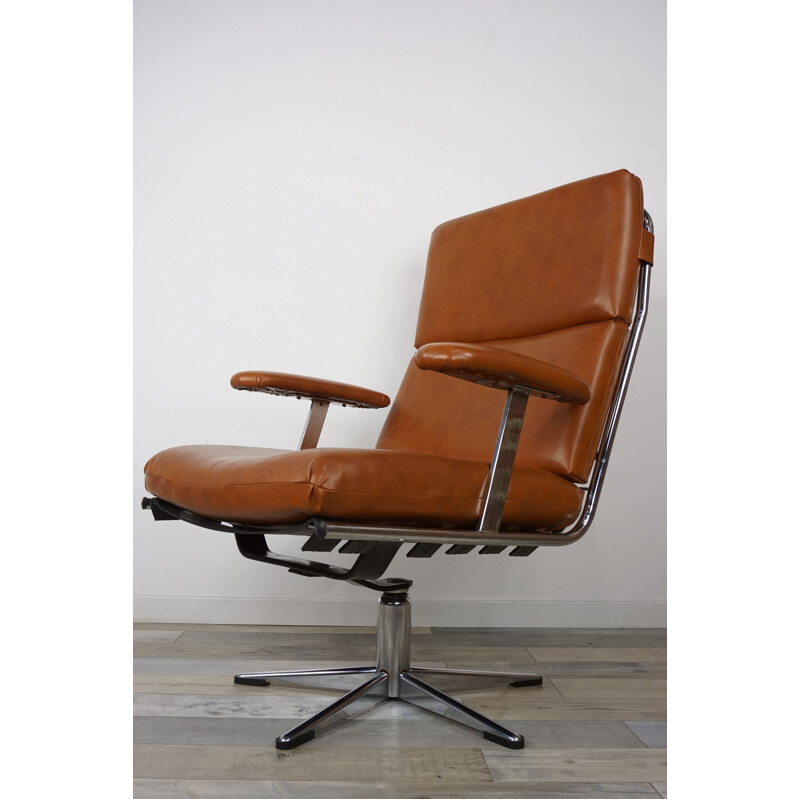 Vintage Belgian swivel armchair