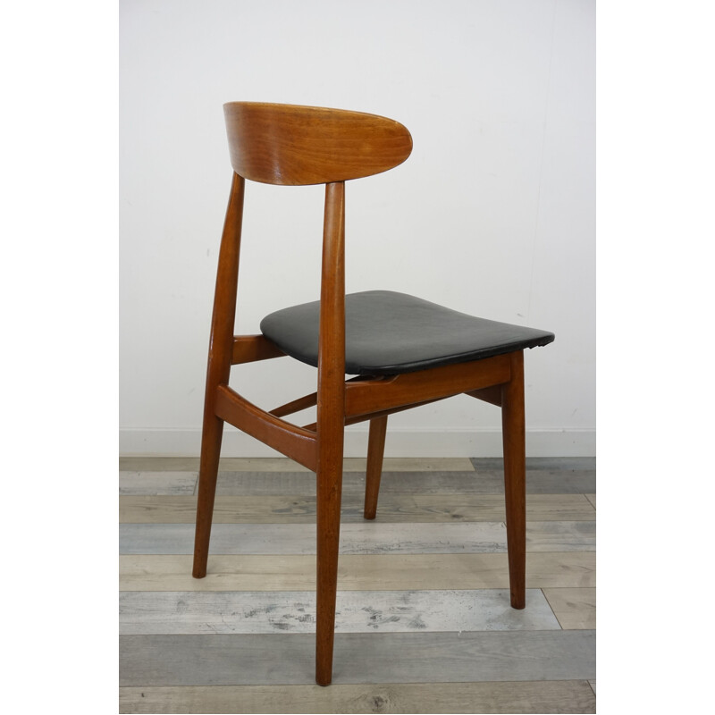 Set of 4 vintage chairs in teak and black leatherette