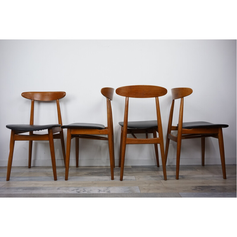 Set of 4 vintage chairs in teak and black leatherette