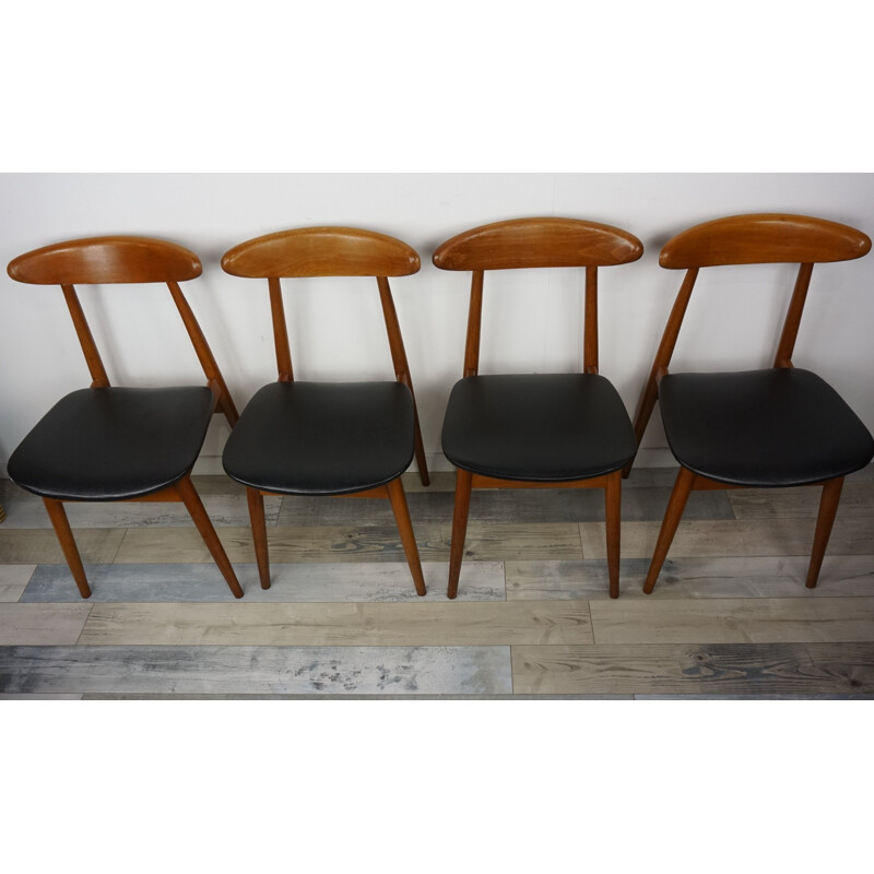 Set of 4 vintage chairs in teak and black leatherette
