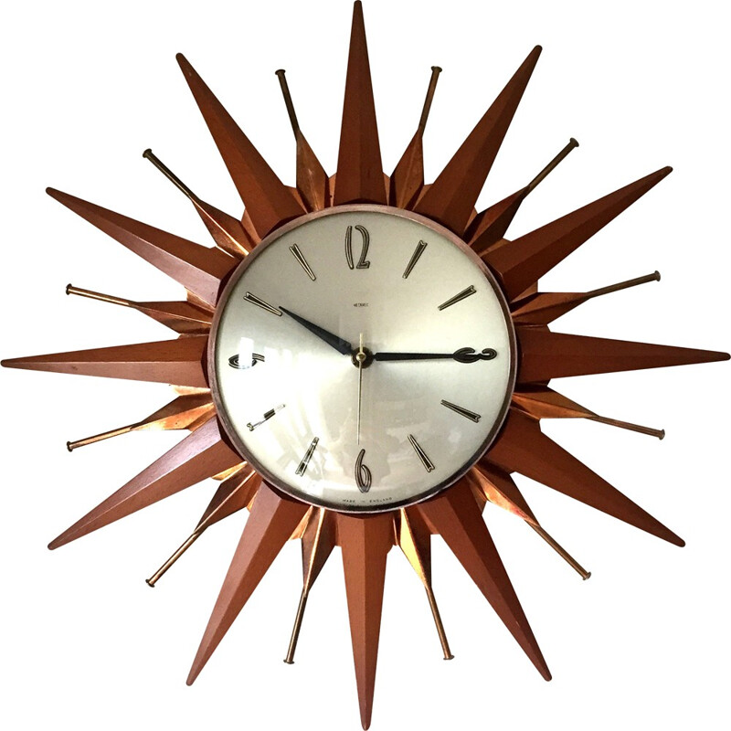 Metamec sunburst wall clock in teak and brass - 1960s