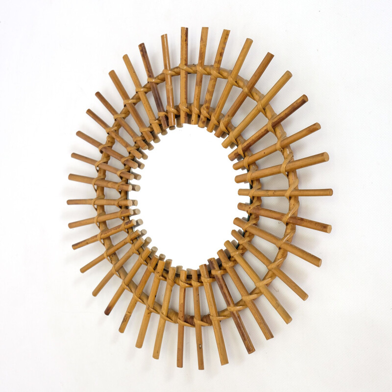 Vintage sun mirror in rattan