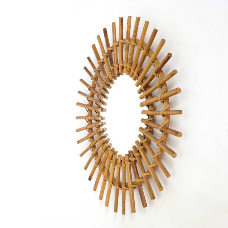 Vintage sun mirror in rattan