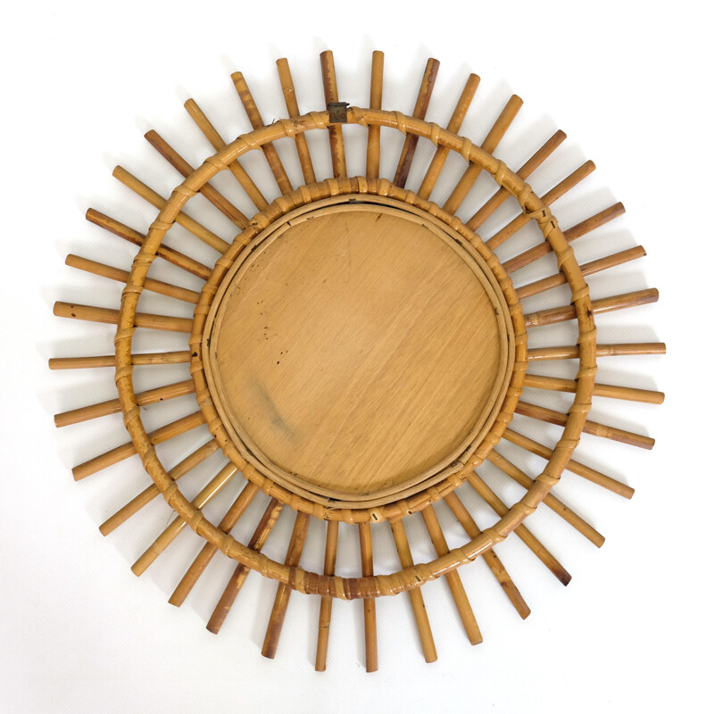 Vintage sun mirror in rattan