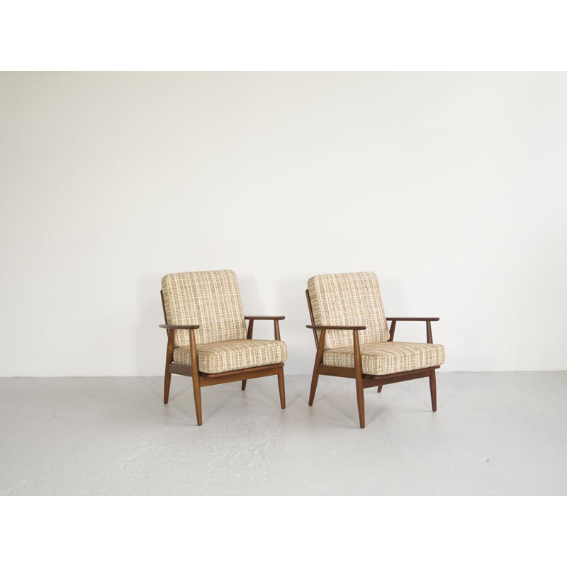 Set of 2 vintage Danish armchairs in solid teak