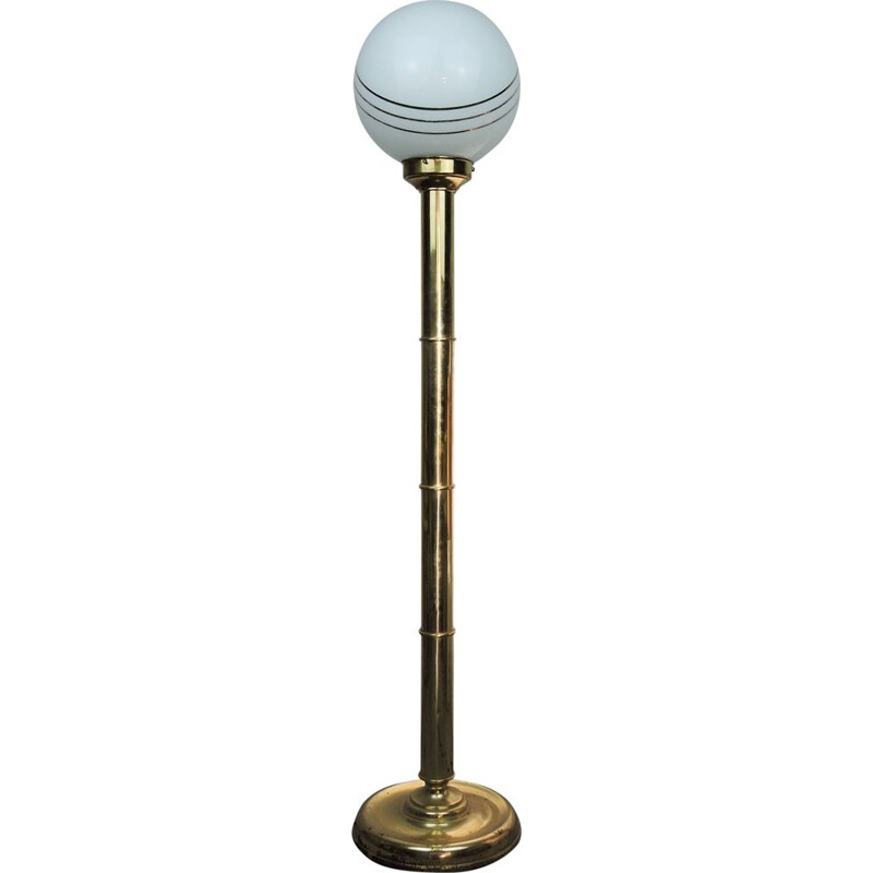 Vintage floor lamp in brass with white globe