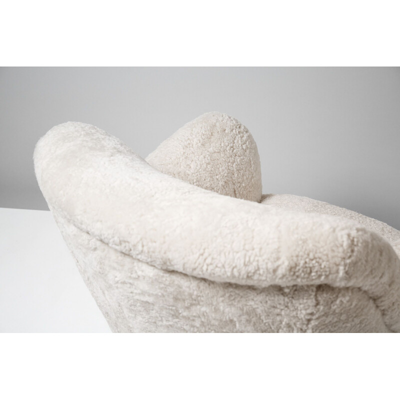 White sheepskin armchair by Elias Svedberg