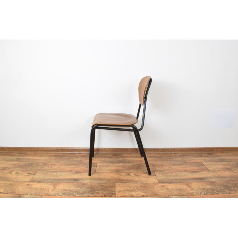 Suite de 4 chaises vintage en teck et acier noir
