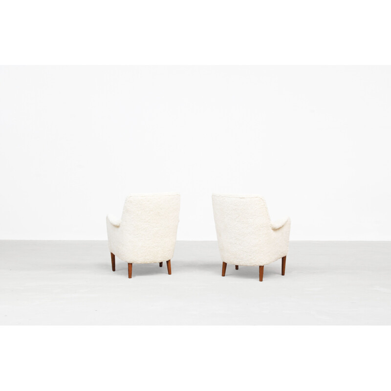 Paire de fauteuils vintage en bois de hêtre