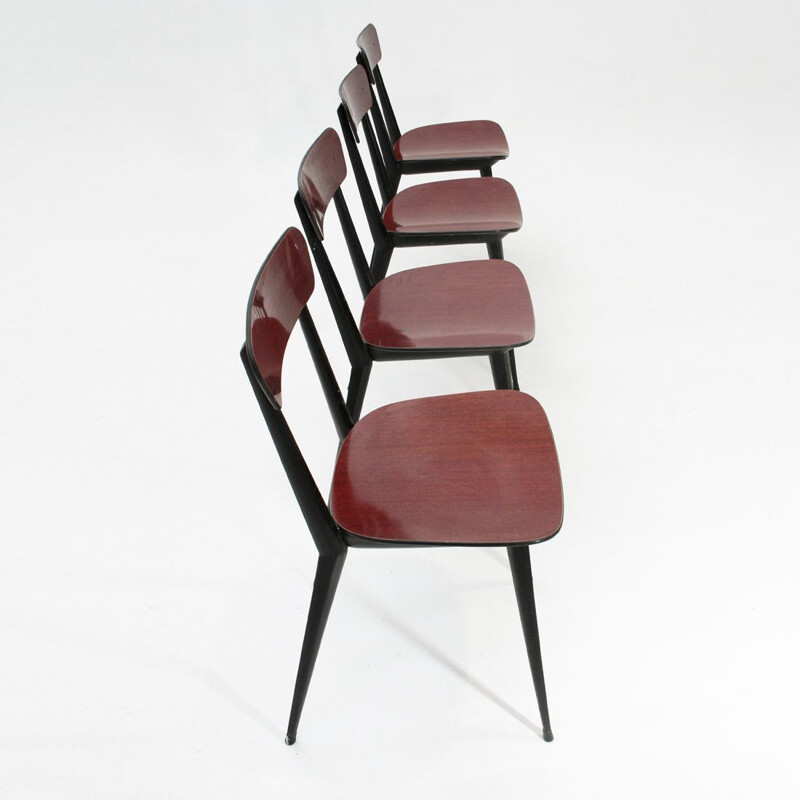 Set of 4 Italian red chairs in metal