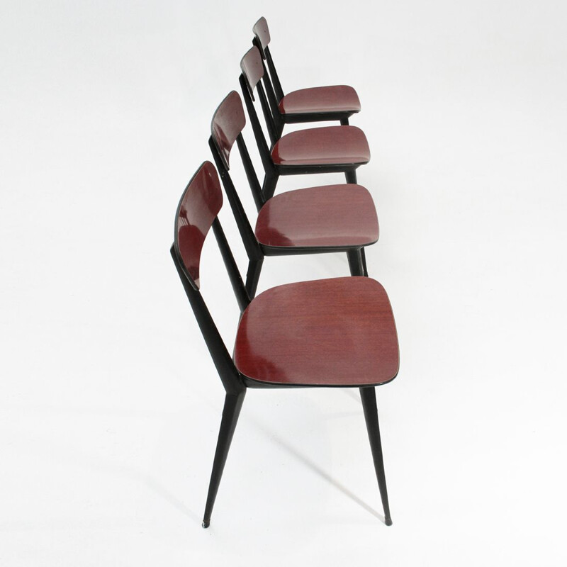 Set of 4 red chairs in metal