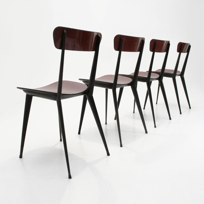 Set of 4 red chairs in metal