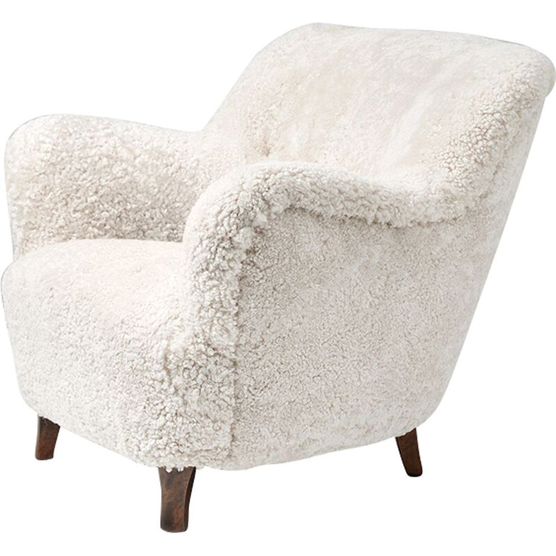 White sheepskin armchair by Elias Svedberg