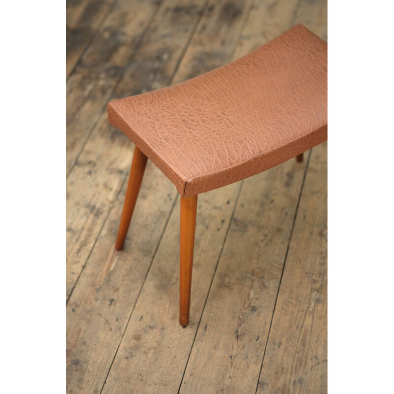 Vintage curved footstool in tan Skai