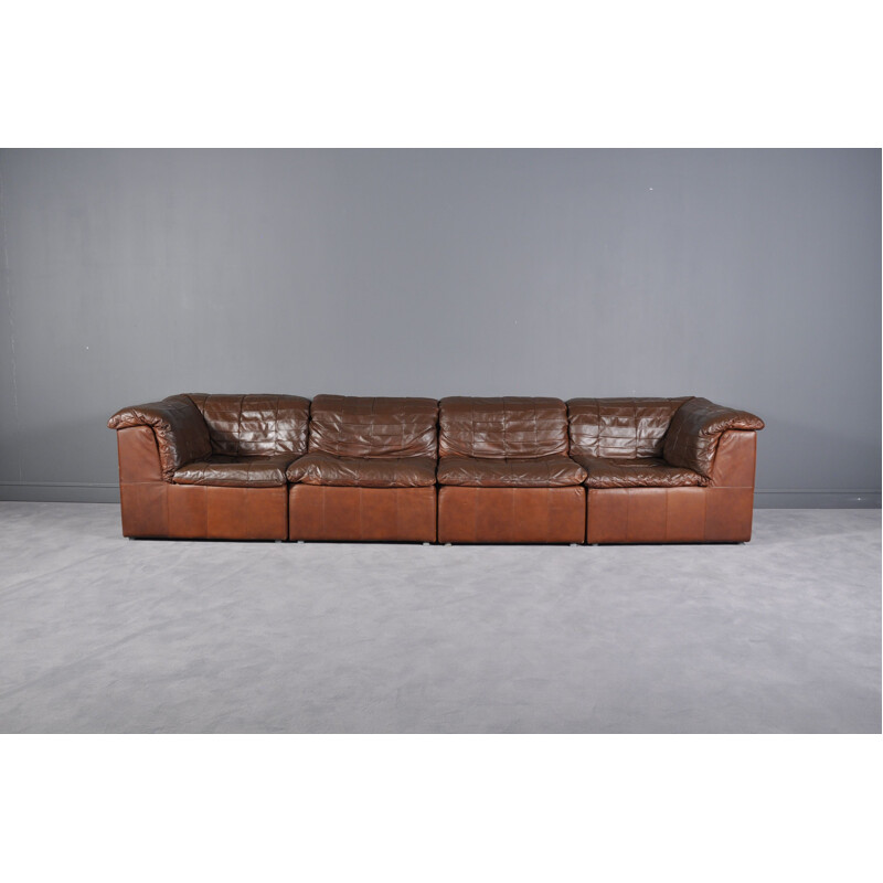 Vintage cognac leather patchwork modular sofa from Laauser