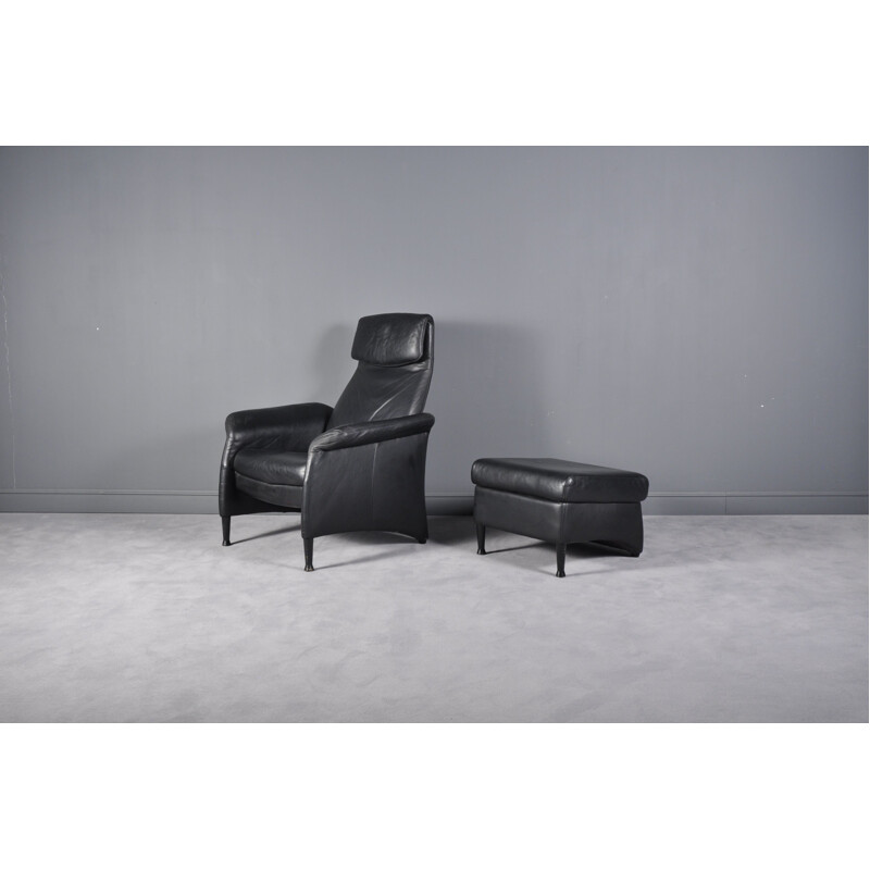 Vintage black leather recliner and ottoman by Walter Knoll