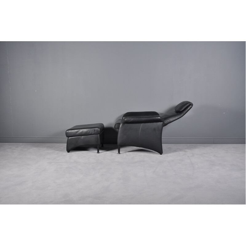 Vintage black leather recliner and ottoman by Walter Knoll