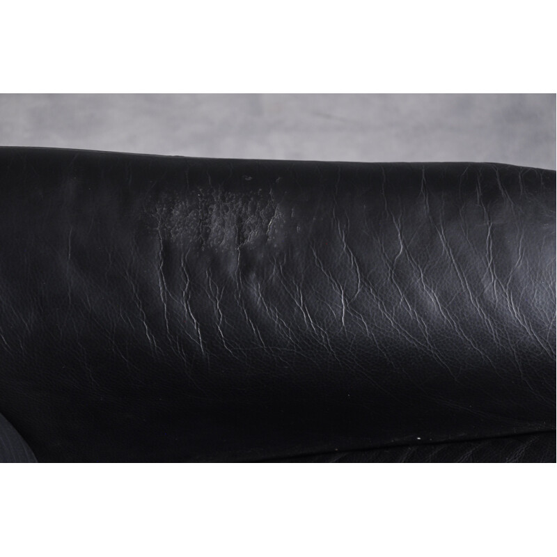 Vintage black leather recliner and ottoman by Walter Knoll