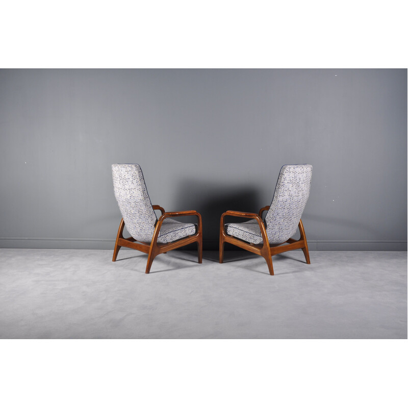 Set of 2 vintage Scandinavian high back lounge chairs in teak