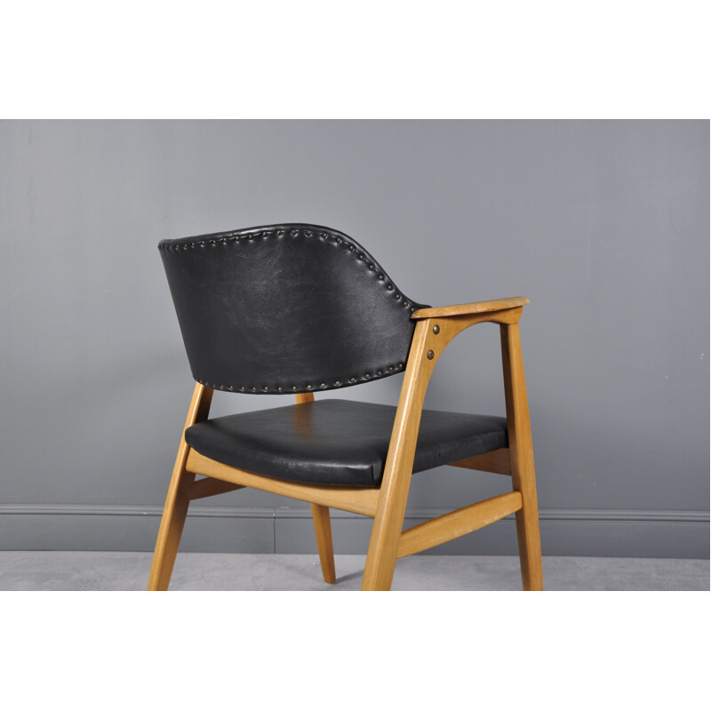 Vintage Danish armchair in oak and faux leather