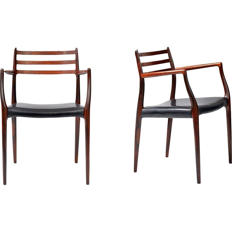 suite de 2 fauteuils vintage 62 en palissandre par Niels Moller