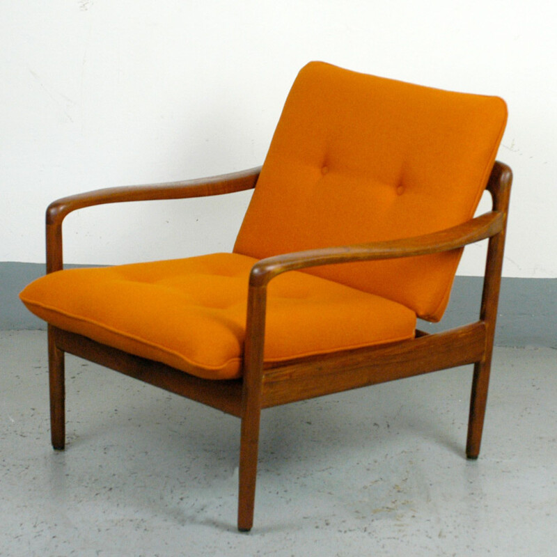 Vintage orange armchair in teak by Knoll Antimott