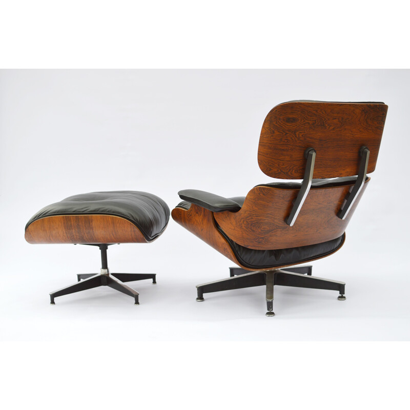 Vintage lounge chair & ottoman in rosewood by Eames for Herman Miller