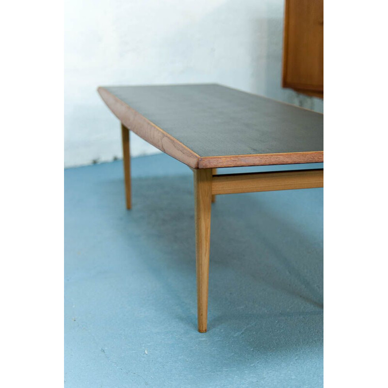 Vintage coffee table in teak with black top