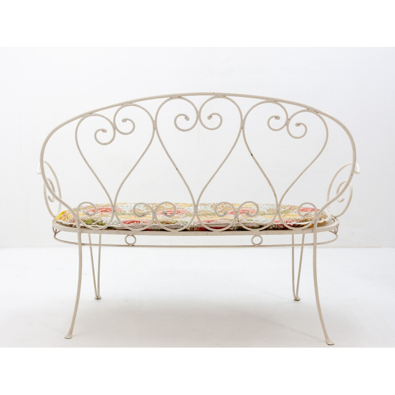 Vintage white garden bench in metal