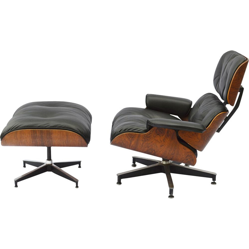 Vintage lounge chair & ottoman in rosewood by Eames for Herman Miller