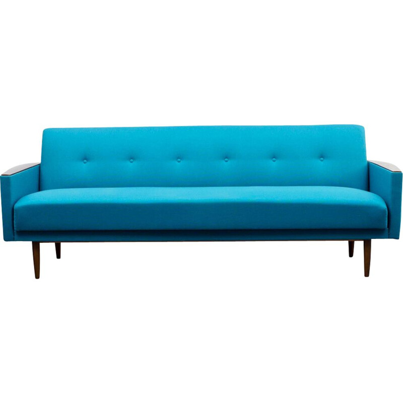 Vintage sofa with fold out bed in petrol blue