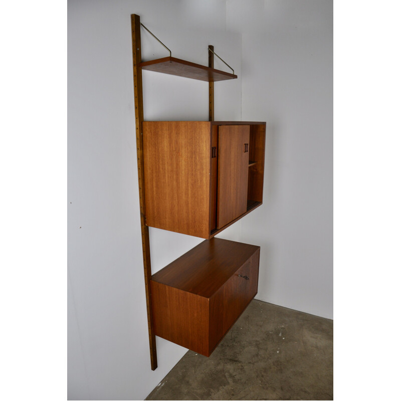 Vintage Royal System wall unit by Poul Cadoviusin teak and brass