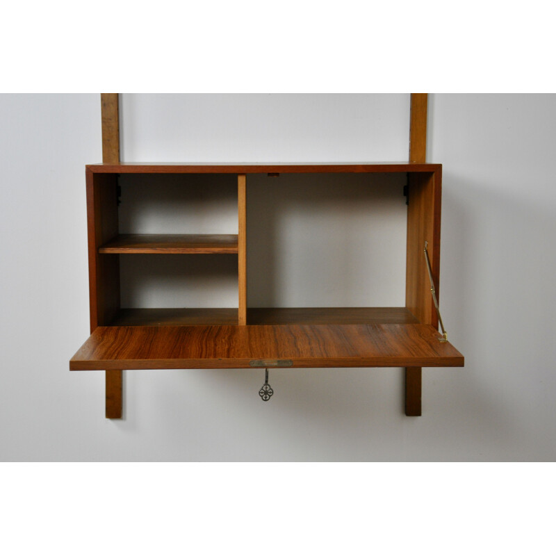 Vintage Royal System wall unit by Poul Cadoviusin teak and brass
