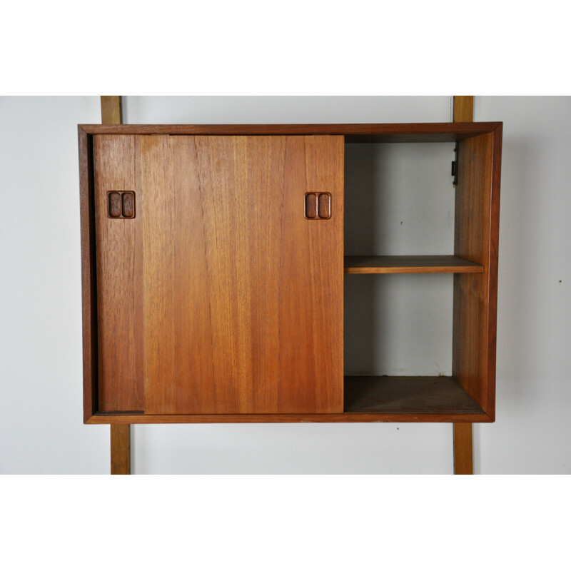 Vintage Royal System wall unit by Poul Cadoviusin teak and brass