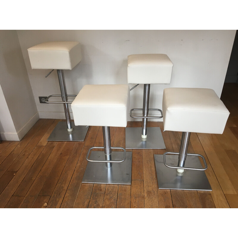 Set of 4 vintage stools in ivory leatherette and steel 1980