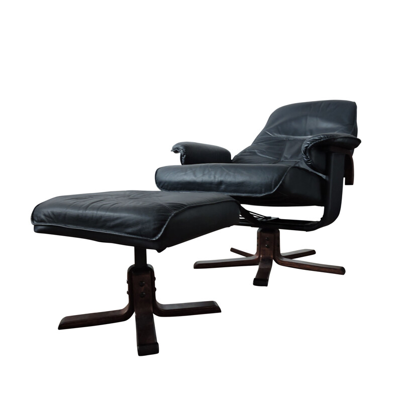 Black leather armchair and ottoman from Unico