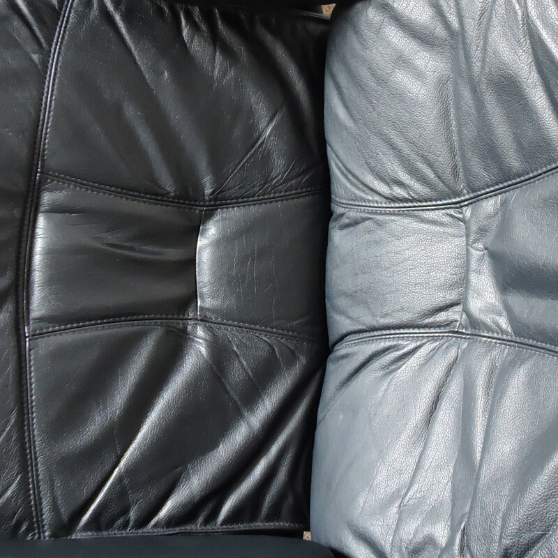 Fauteuil et ottoman en cuir noir par Unico