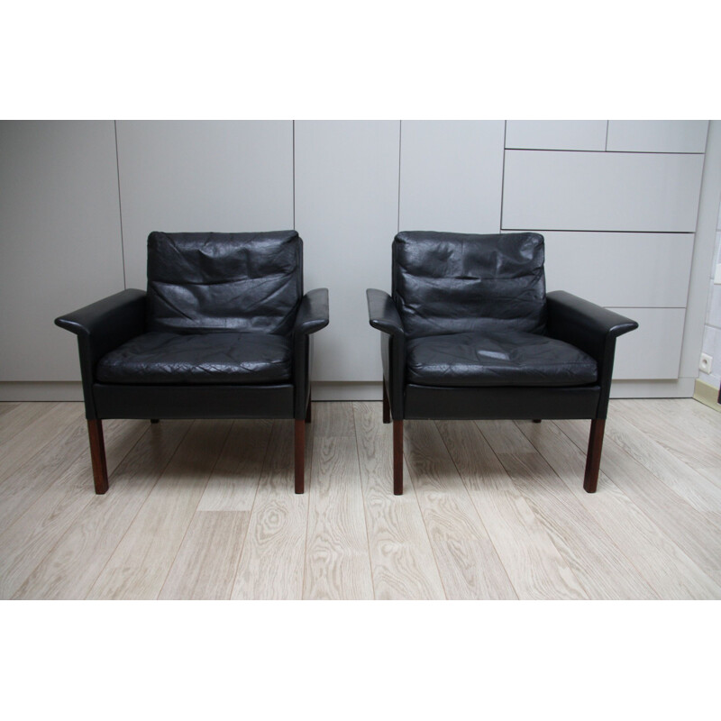 Pair of black leather Club armchairs by Hans Olsen