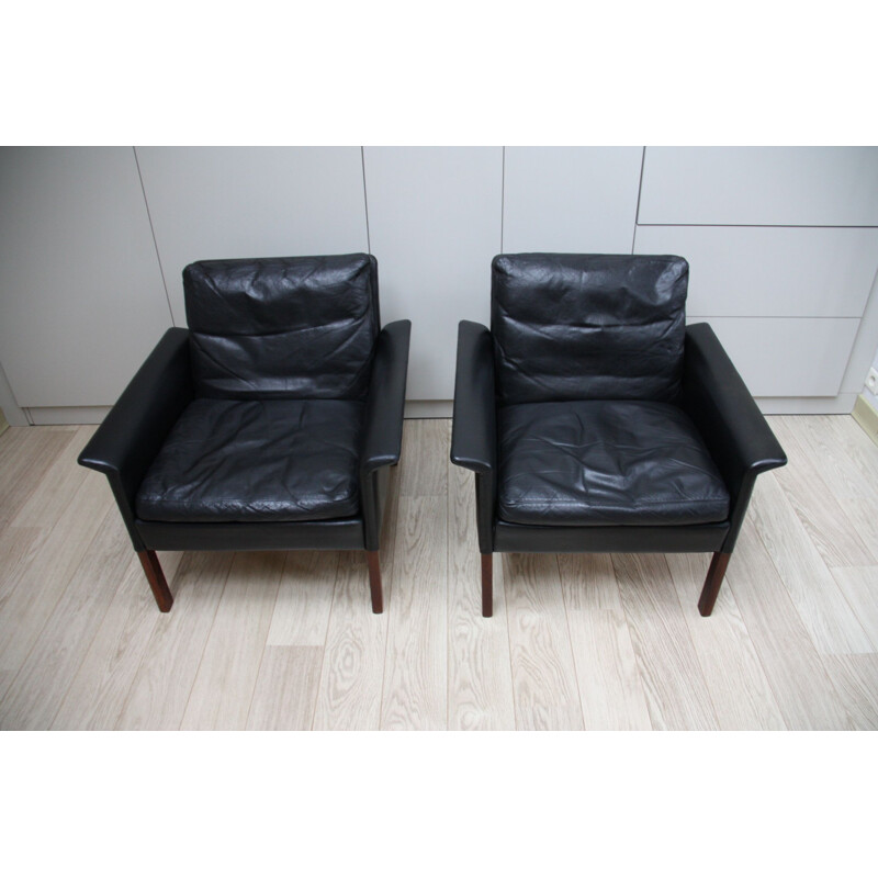 Pair of black leather Club armchairs by Hans Olsen