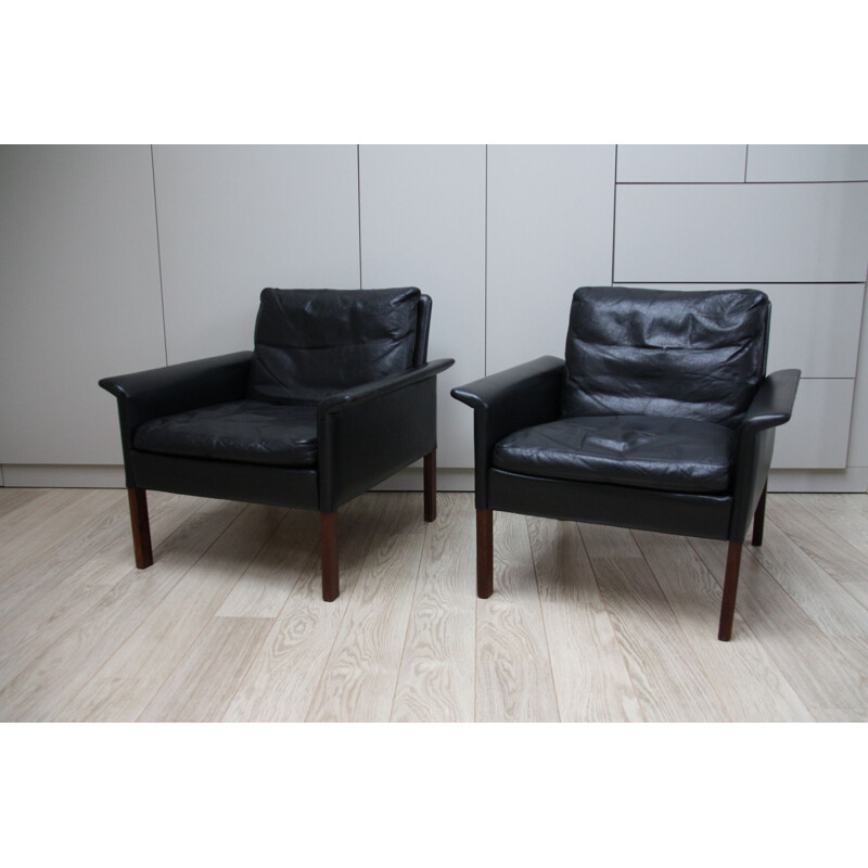 Pair of black leather Club armchairs by Hans Olsen