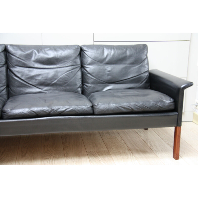 Vintage 4-seater sofa in black leather by Hans Olsen