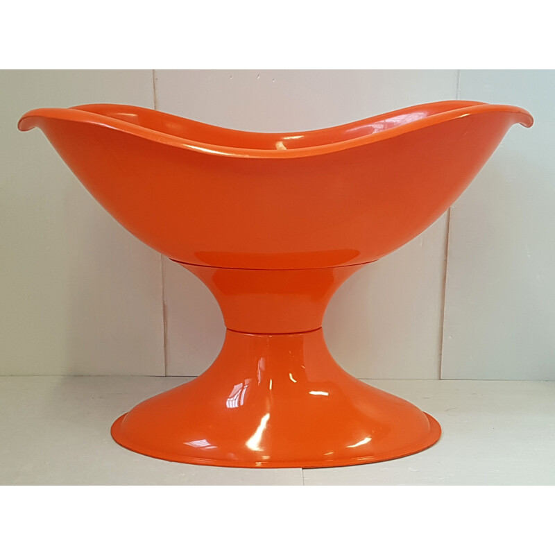 Vintage orange plastic cradle