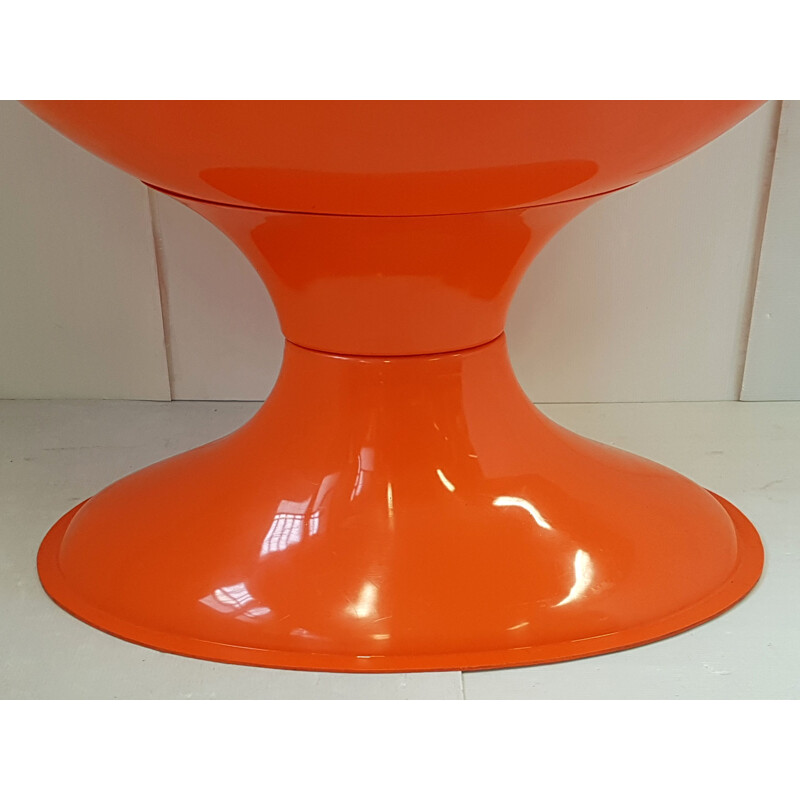 Vintage orange plastic cradle