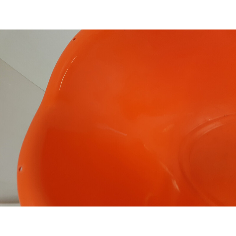 Vintage orange plastic cradle