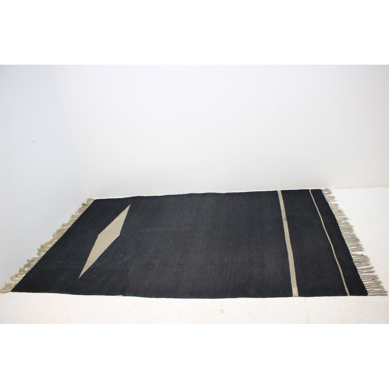 Vintage black carpet in wool