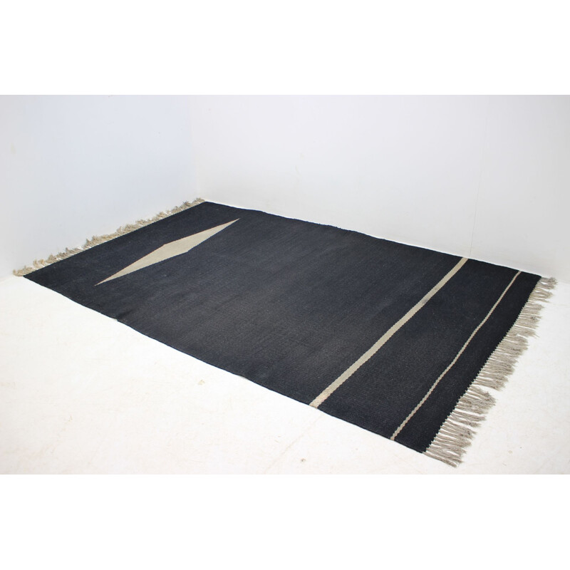 Vintage black carpet in wool