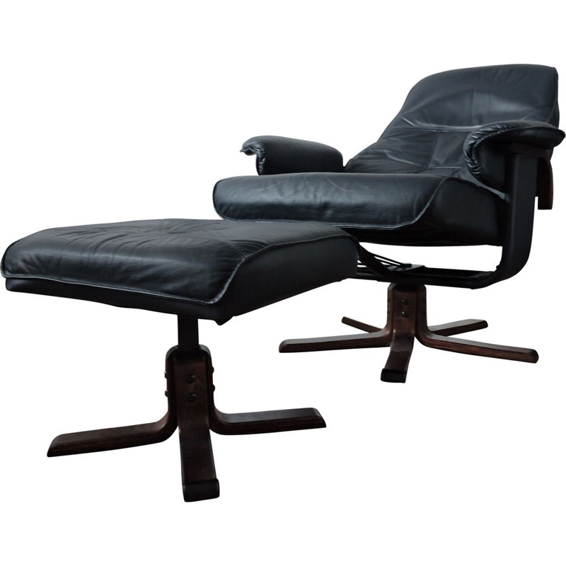 Black leather armchair and ottoman from Unico