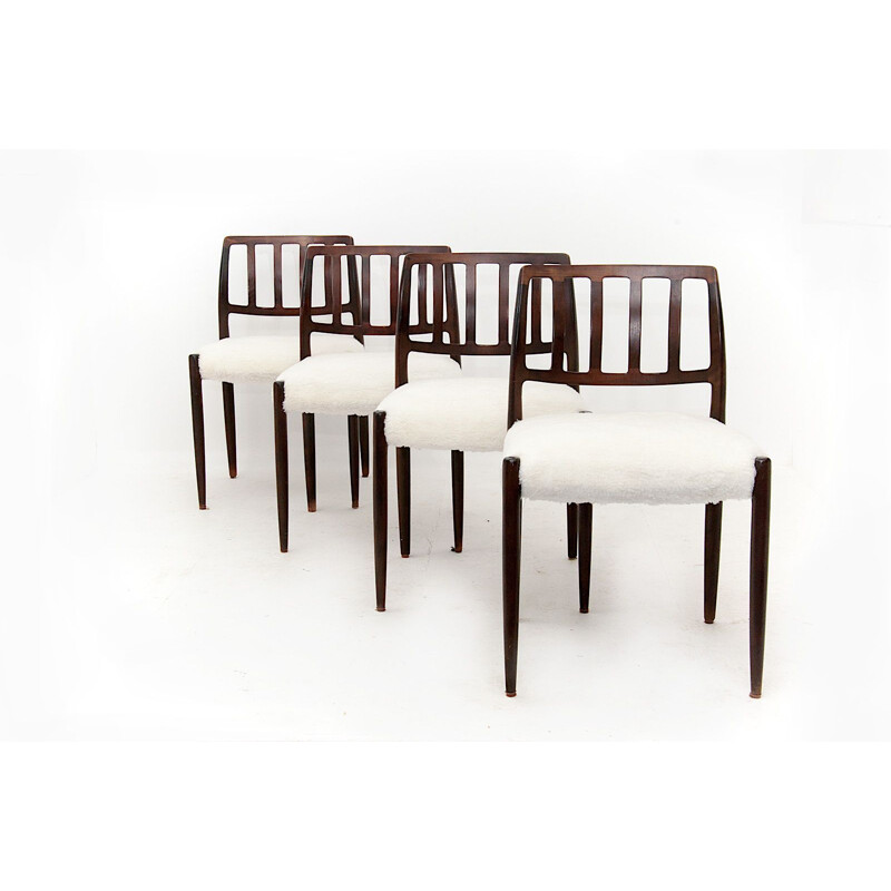 Set of 4 white chairs in teak by Niels O. Moller