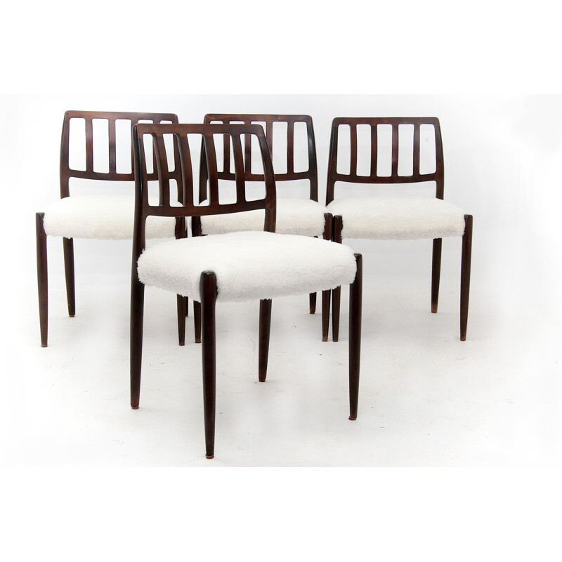 Set of 4 white chairs in teak by Niels O. Moller