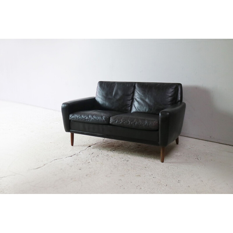 Vintage black leather Danish sofa
